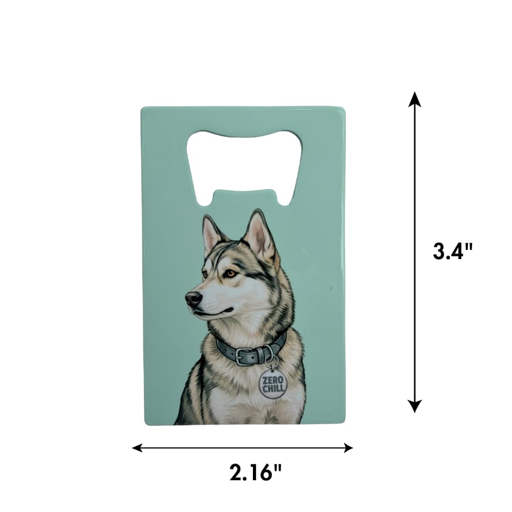 Agouti husky bottle opener; pale grey-green background on flat rectangular bottle opener with illustration of a dog. Double arrows with size dimensions on one side and bottom.