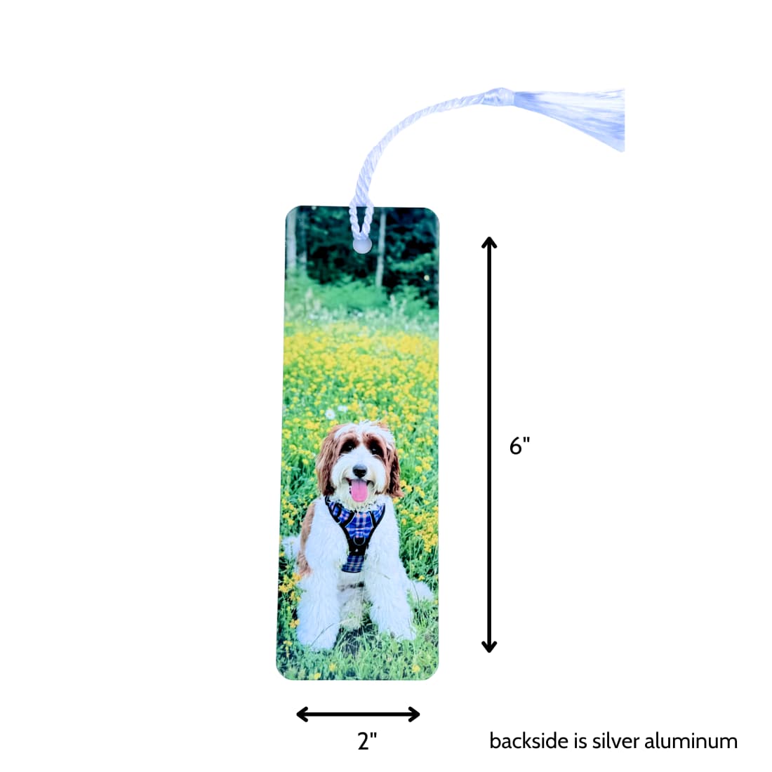Custom metal bookmark with Goldendoodle photo, 2 inches wide by 6 inches tall, silver aluminum back with white tassel