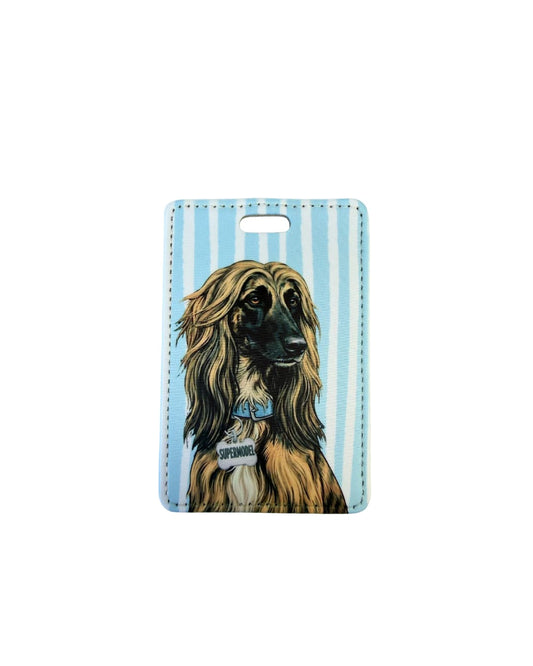 Afghan hound luggage tag; Fun faux leather luggage tag with a refined Afghan Hound with flowing tan hair wearing a light blue collar and Supermodel charm, vertical light blue and white stripes, white background.