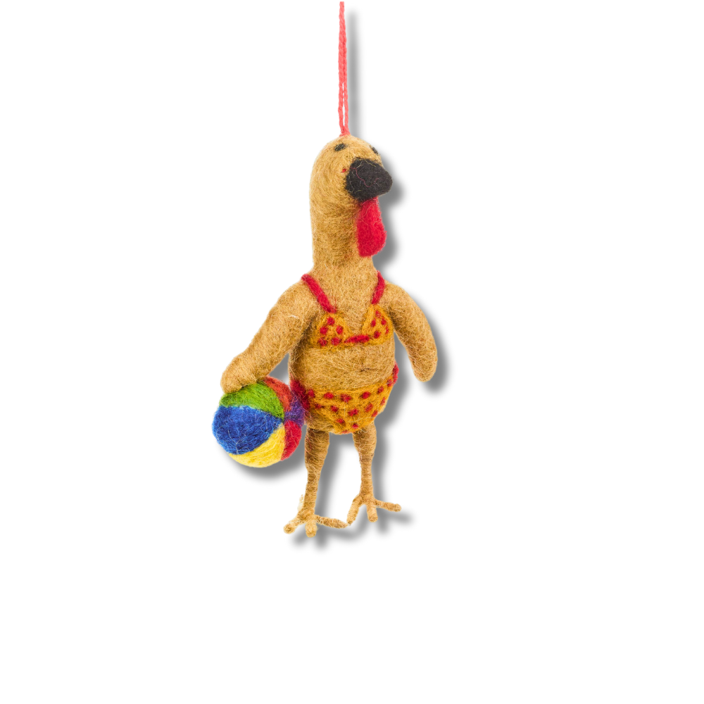 Fun Turkey ornaments for Thanksgiving. The felt turkey wearing a yellow and red bikini and holding a colorful beach ball. 