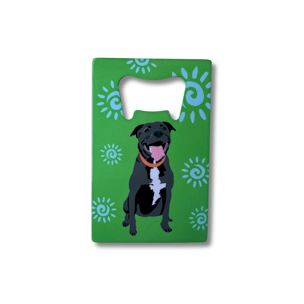 Green background with black pit bull bottle opener; dog illustration on a green background with blue abstract sun patterns