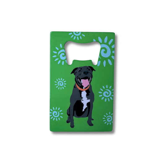 Green background with black pit bull bottle opener; dog illustration on a green background with blue abstract sun patterns