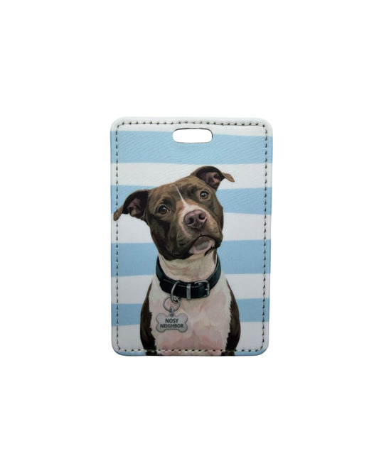 Brown and white pitbull luggage tag; Fun faux leather luggage tag with an illustrated brown and white Pitbull wearing a Nosy Neighbor charm, light blue and white horizontal stripes, white background.