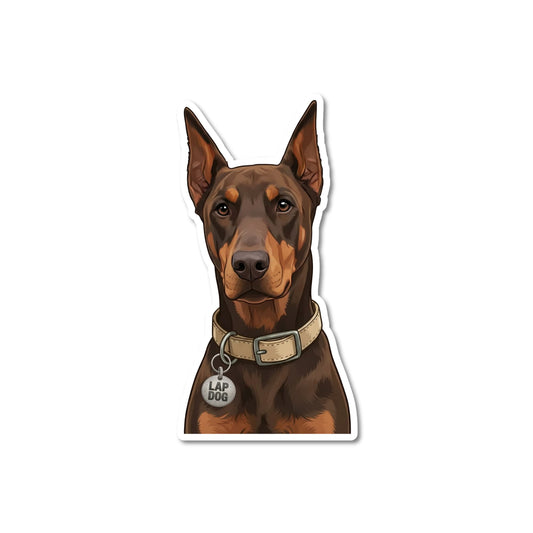 Brown Doberman sticker, kiss-cut waterproof matte vinyl featuring a brown and tan Doberman Pinscher with a beige collar and circular Lap Dog charm, white contour border, white background.