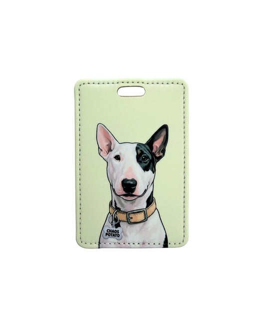 Bull Terrier luggage tag; a vertical faux leather luggage tag featuring a black and white English Bull Terrier with a Chaos Potato collar tag against a pale yellow-green background.