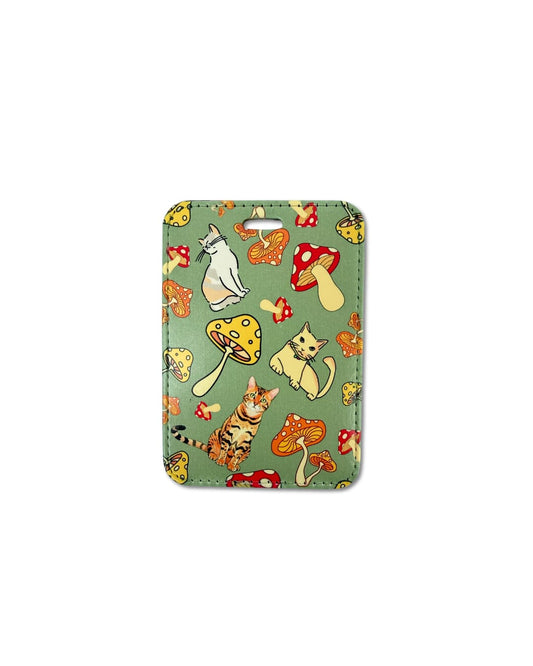 cat mushroom luggage tag featuring illustrated cats and mushrooms on a green patterned background