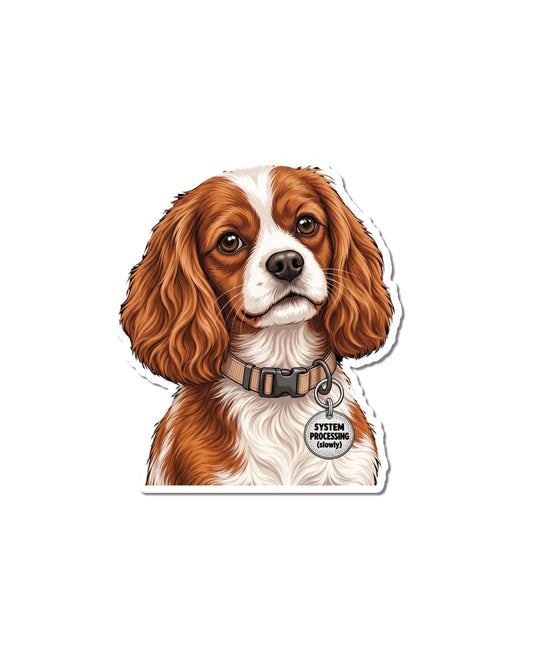 Cavalier King Charles Spaniel sticker showing a Blenheim Cavalier in a tan collar with a round tag that says SYSTEM PROCESSING slowly