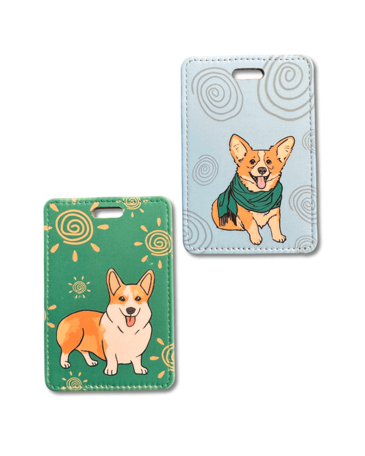 Two corgi luggage tags on a white background; one tag is light blue gray and the other green