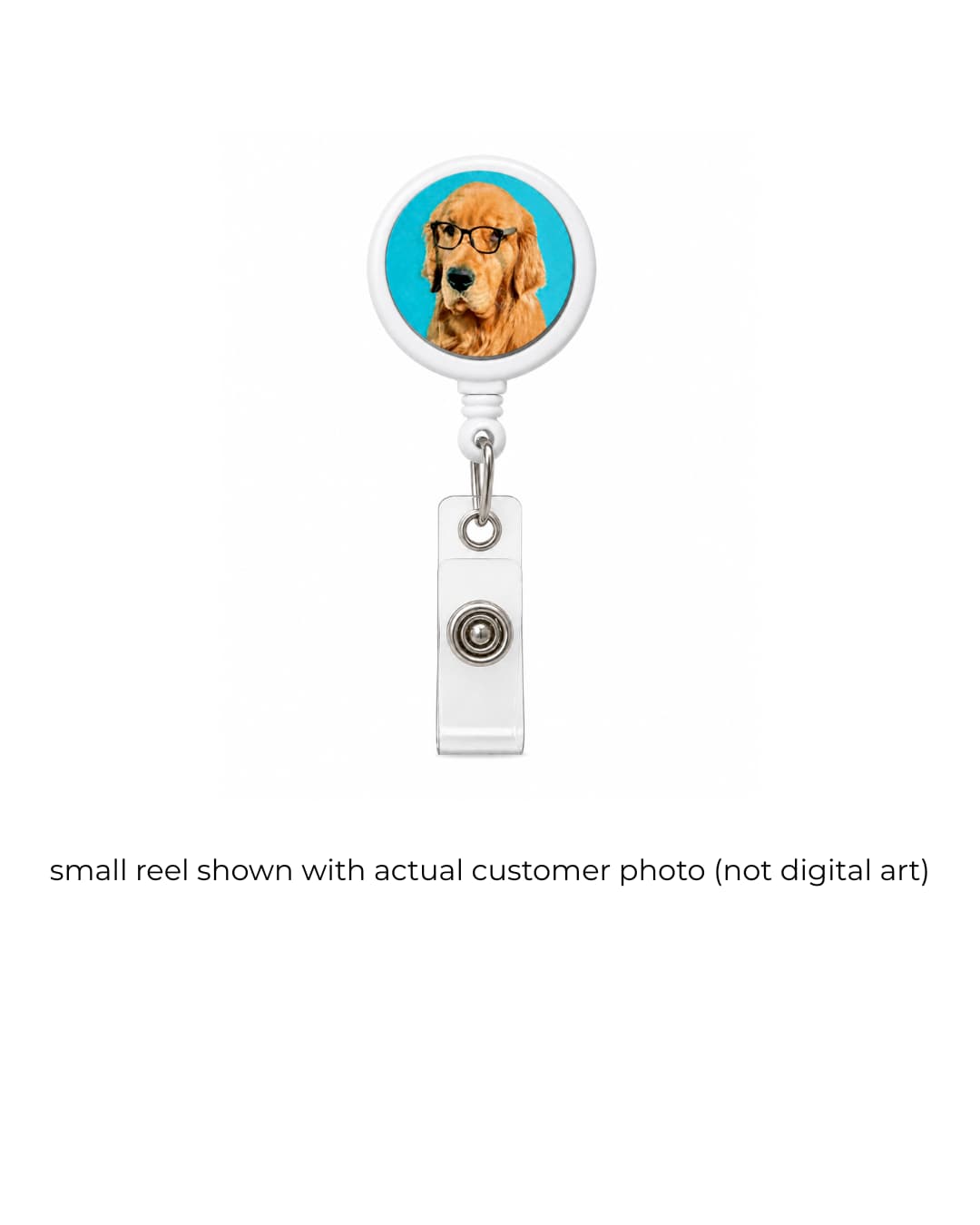 Small custom pet badge reel with actual customer photo, golden cocker spaniel wearing glasses on teal background, white reel and clear vinyl strap