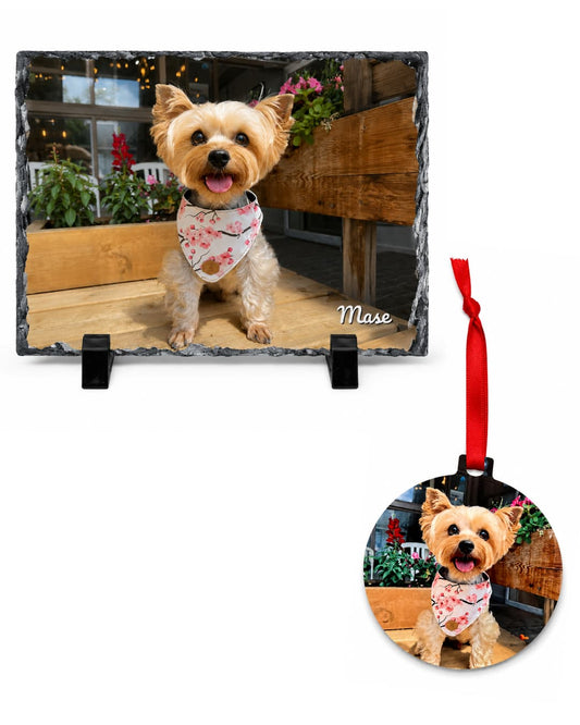 Rectangular dark gray natural stone photo slate displaying a smiling Yorkie named Mase in a pink bandana, paired with a round aluminum ornament with red ribbon, pet sympathy gift set by Sly Dawg Studio
