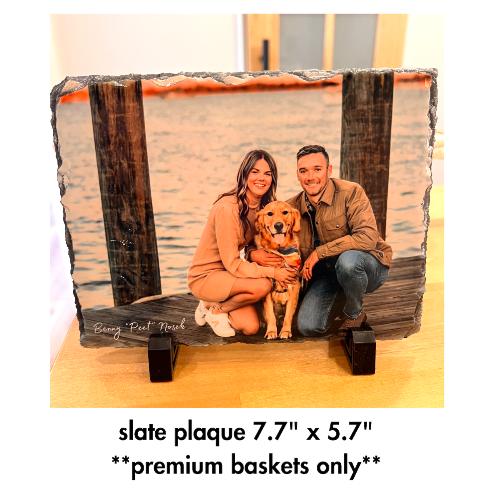 Pet sympathy gift. A photo on slate of couple on a dog with their golden retriever between them. 
