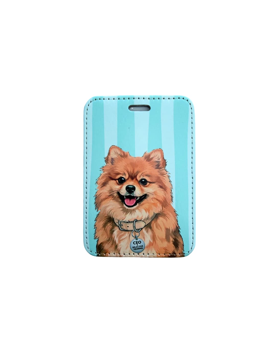 cute pomeranian luggage tag flat lay on white background showing smiling orange Pomeranian with CEO of Selective Hearing round collar tag on blue and white vertical striped faux leather tag