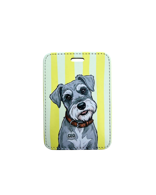 cute schnauzer luggage tag flat lay showing gray miniature schnauzer with CEO collar tag on yellow and white striped faux leather travel tag