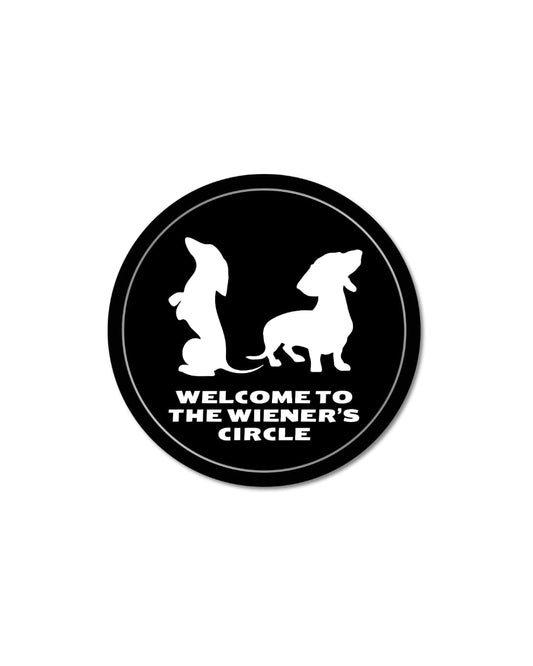 doxie dachshund sticker black circular design with two dachshund silhouettes and welcome to the wieners circle text matte vinyl decal