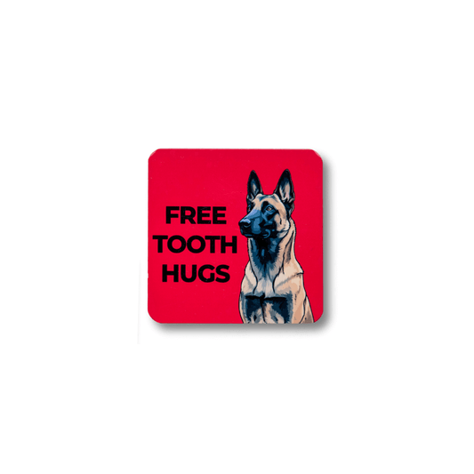 Red square Belgian Malinois magnet; dog illustration and 'FREE TOOTH HUGS' text on a white background