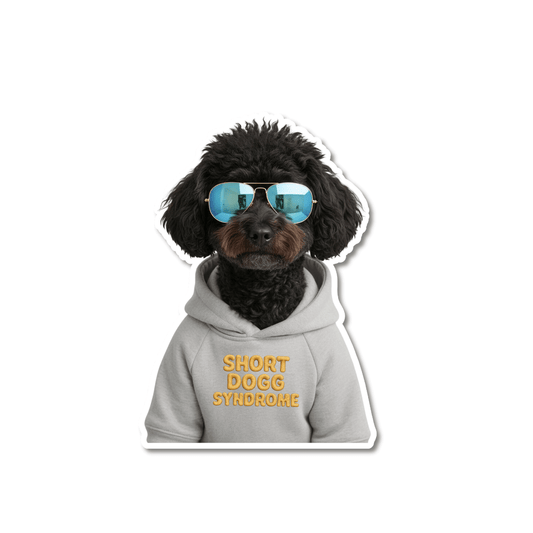 Funny black doodle sticker; curly-coated black poodle or doodle wearing blue aviator sunglasses and a gray hoodie that reads “Short Dogg Syndrome,” on a white background.