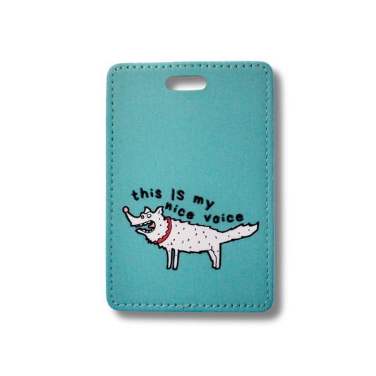 Teal luggage tag with snarling funny cartoon dog: this is my nice voice