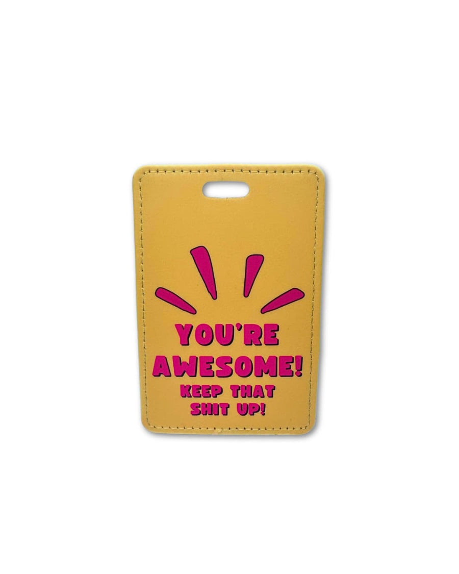 Bright orange-ish yellow suitcase tag with hot pink words: YOU'RE AWESOME, KEEP THAT SHIT UP (and lines coming up to accentuate the words)