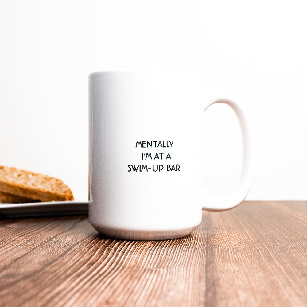 funny office mug. Minimalist style, white mug with small black text  "mentally I"m a swim-up bar" 