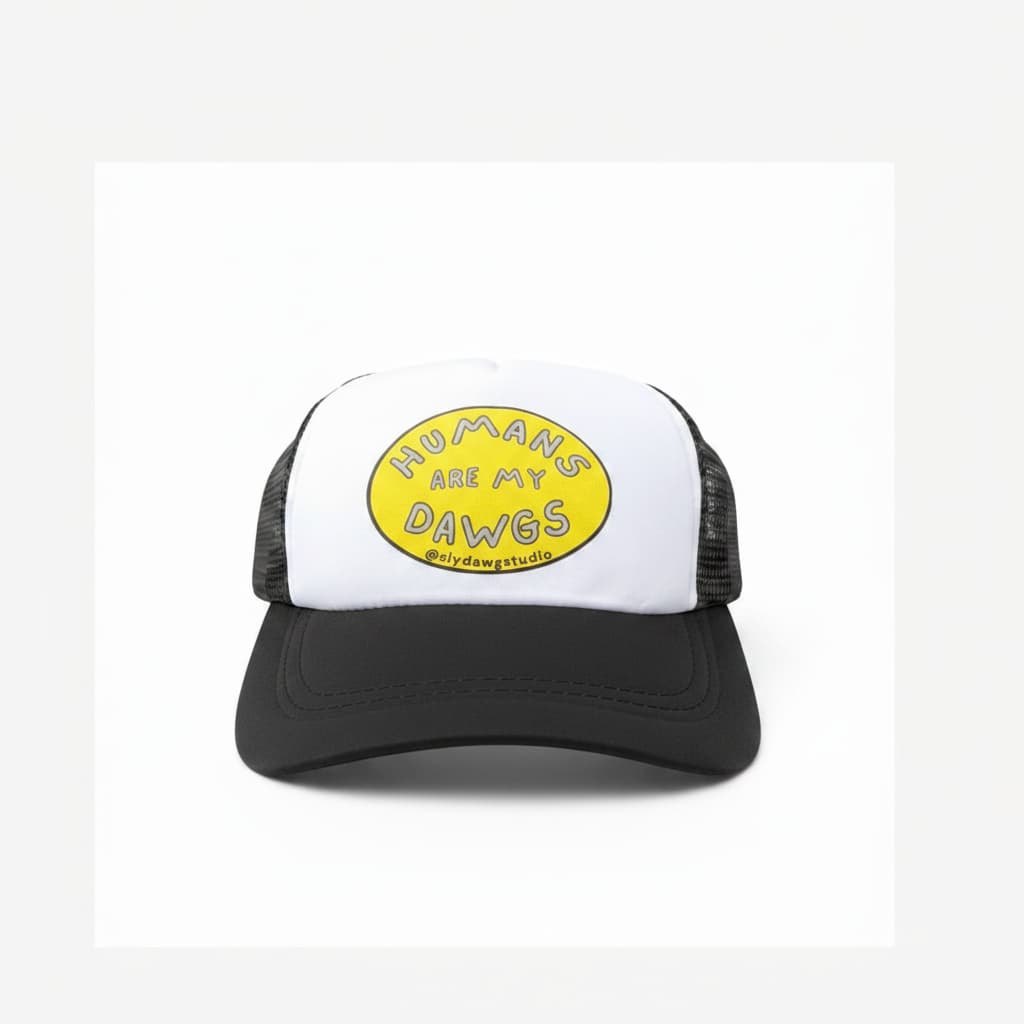 Trucker hat for dogs lifestyle; hand holding a black and white Humans Are My Dawgs dog trucker hat on white background.