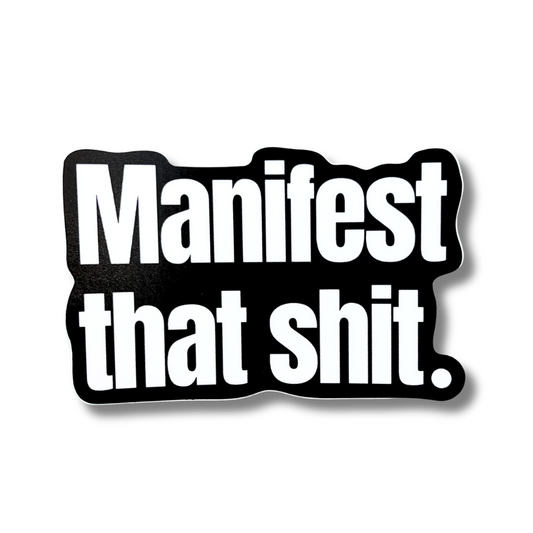 Black and white sticker that says “Manifest that shit” in large bold font