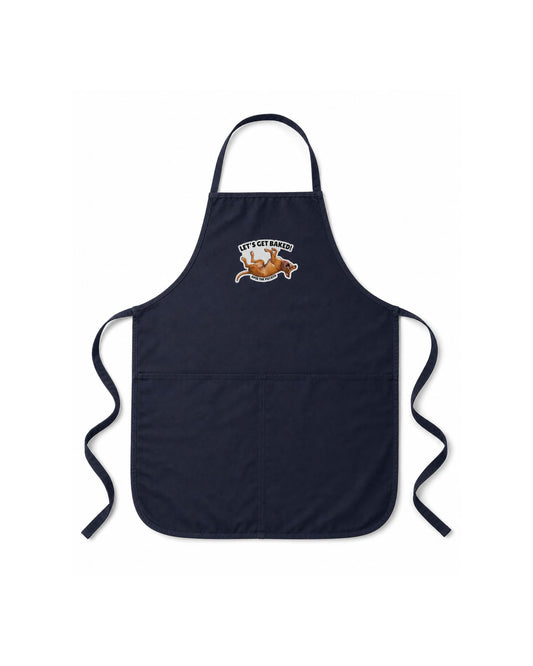 Opie Let's Get Baked apron layflat on white background, navy blue bib apron with Opie the Potato sunbathing graphic on chest, official @justopiethings merch by Sly Dawg Studio