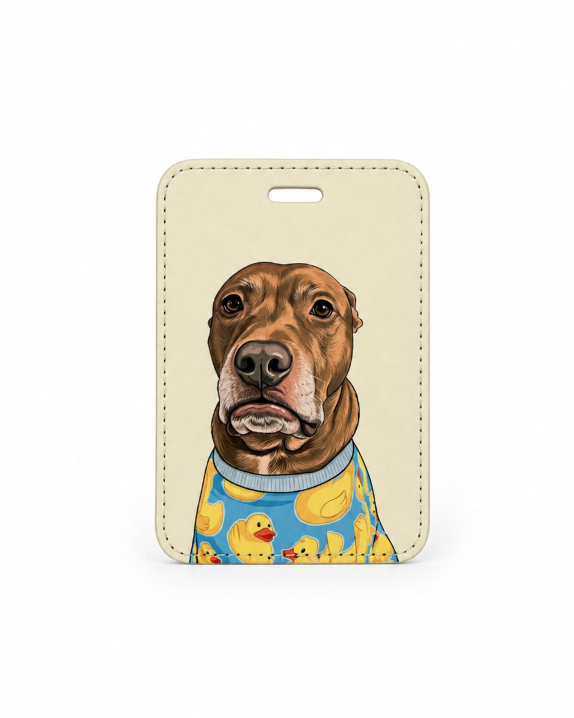 Opie luggage tag featuring the pit bull mix in blue duck pajamas with neck rolls on cream faux leather background.