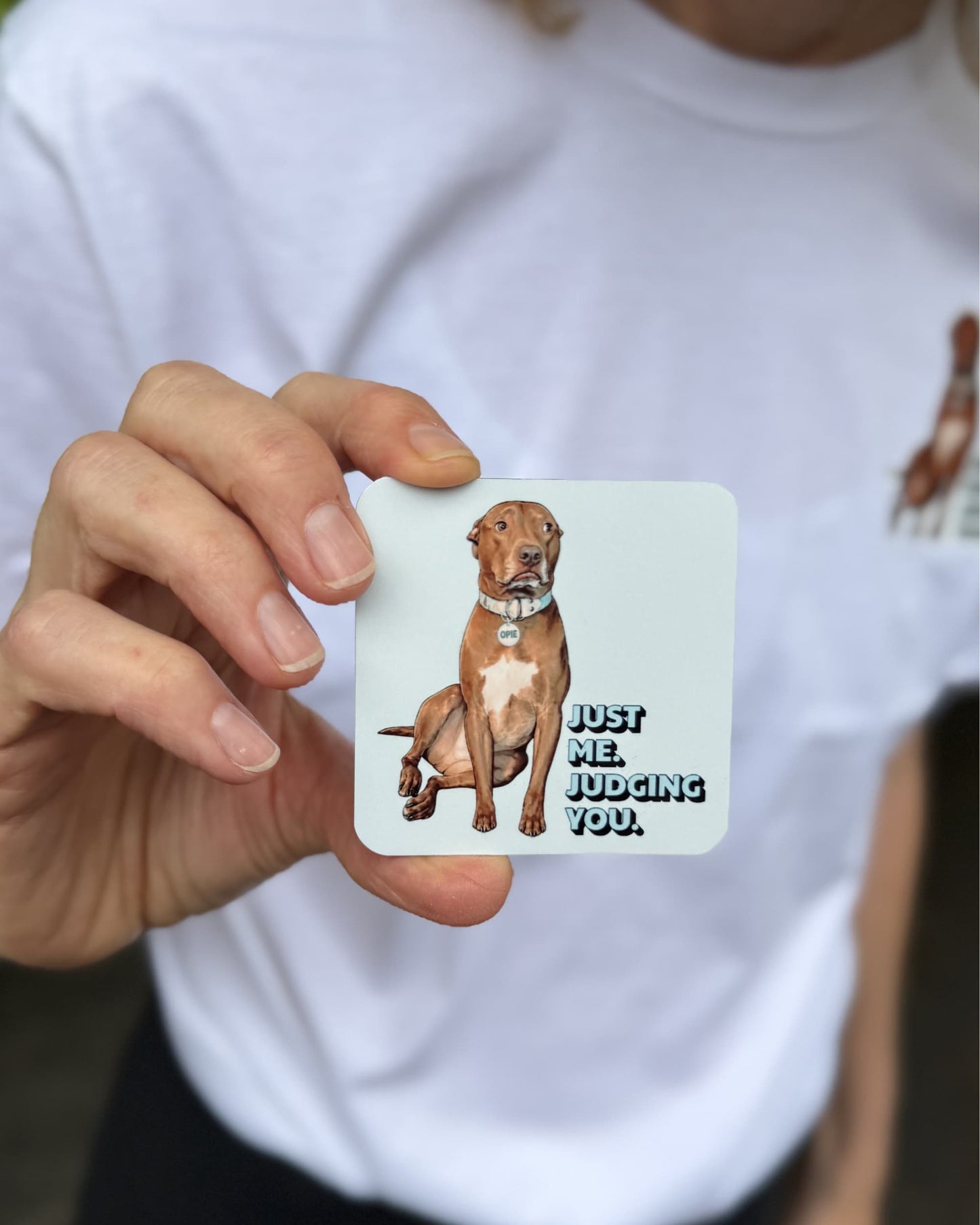 Person holding Opie Magnet Judging You wearing white Just Me Judging You t-shirt