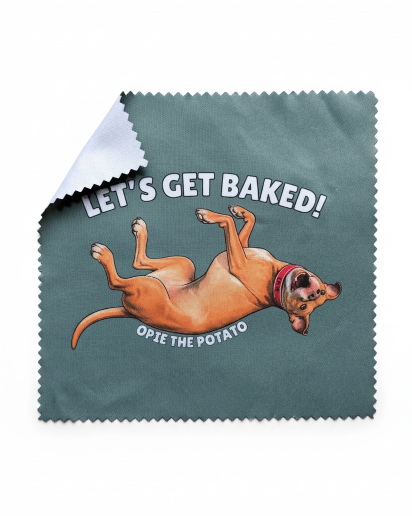 Opie the Potato microfiber cloth on white background with corner folded to show blank white backing, slate blue with rolling pit bull illustration