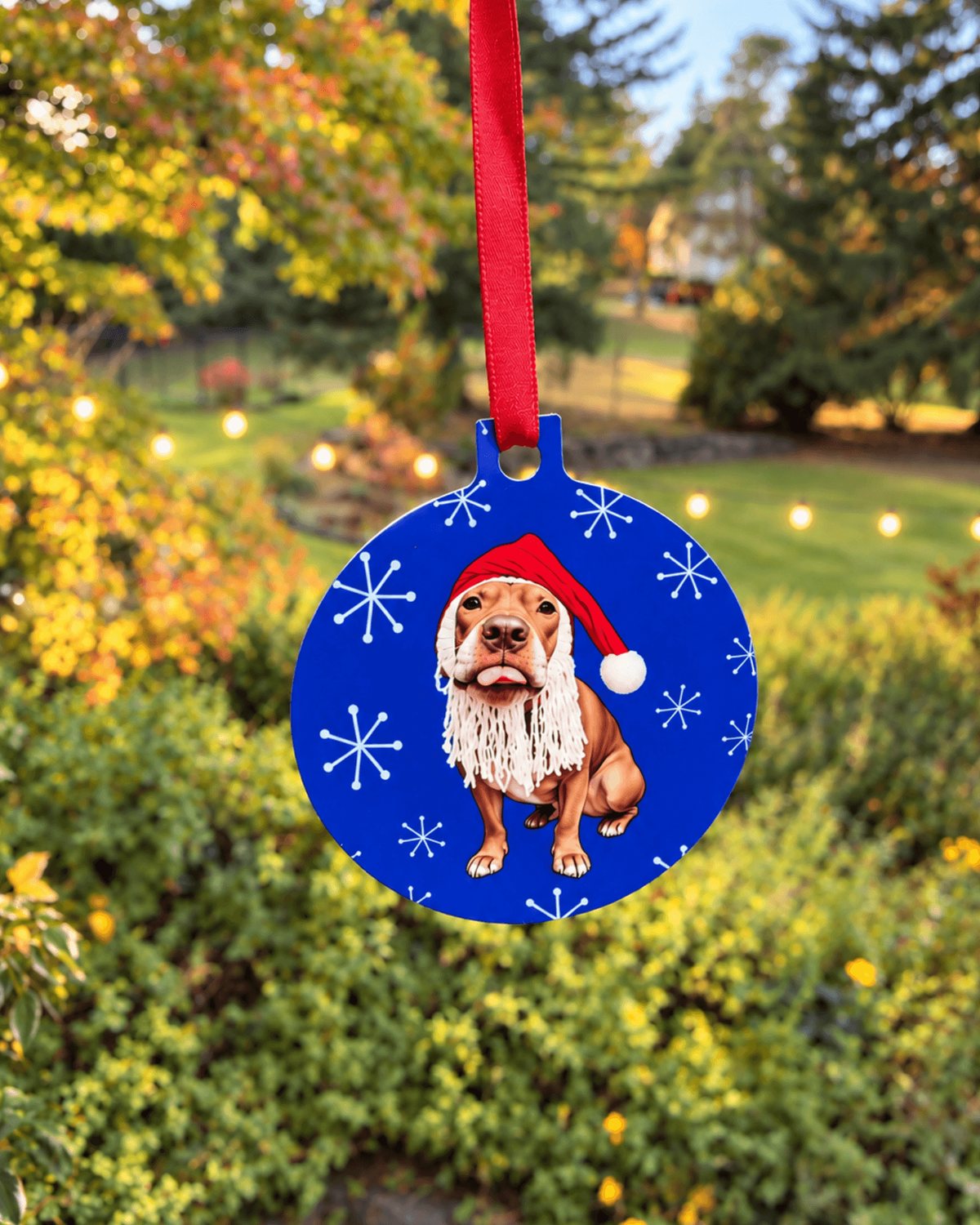 Opie pit bull Christmas ornament hanging on a Christmas tree, Santa dog ornament