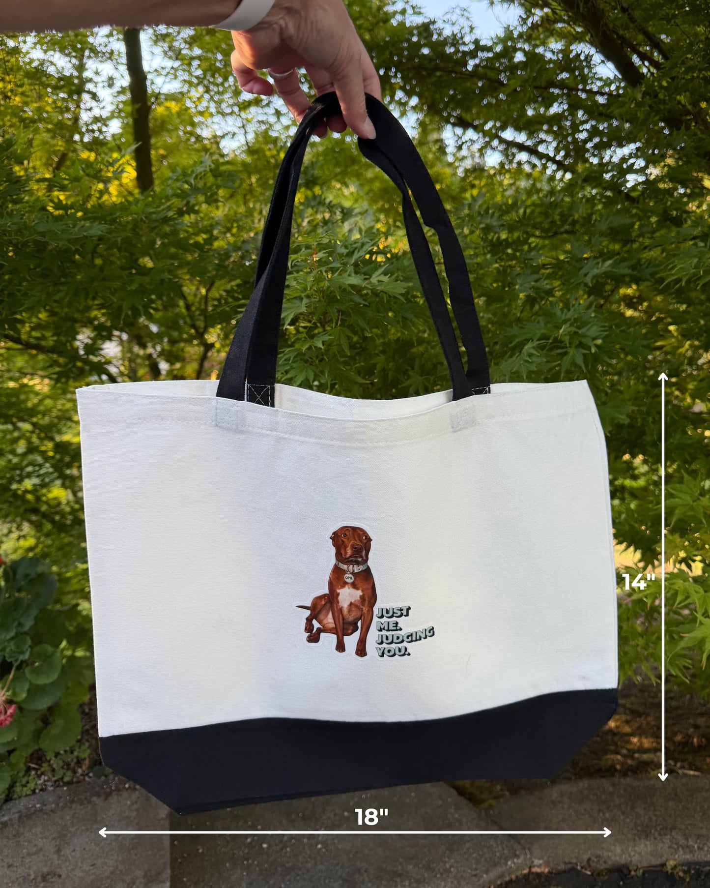 pie tote bag held up outdoors showing dimensions, 18 inches wide by 14 inches tall, Just Me Judging You pit bull canvas tote by Sly Dawg Studio