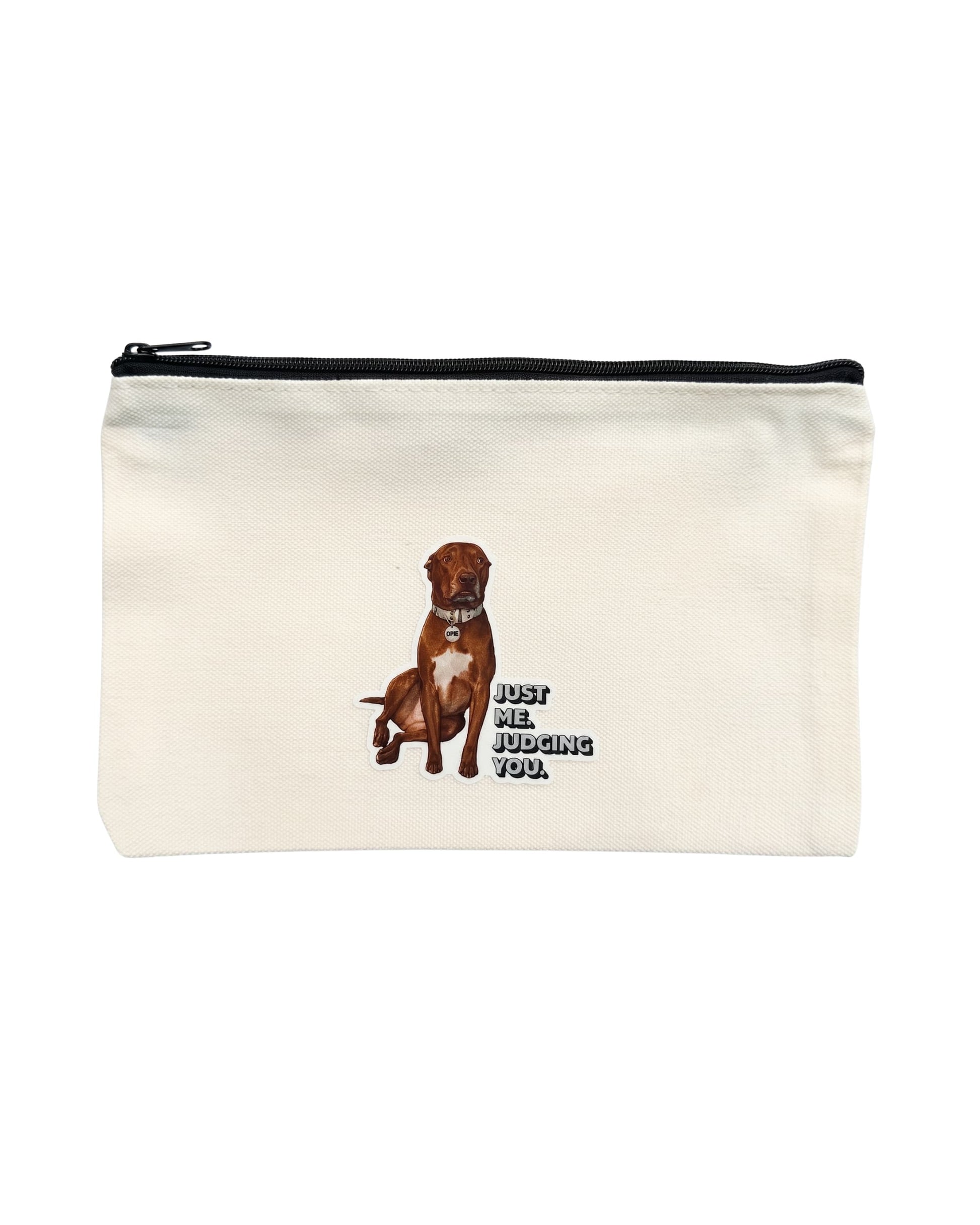 Opie zipper pouch: Beige canvas bag with top zipper. Design of Opie the pit bull with caption "Just me. Judging you." on front. White background.