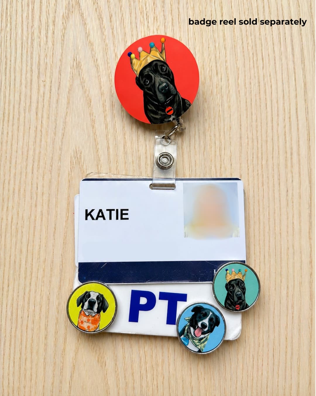 Personalized pet photo pins decorating a physical therapist ID badge and dog-themed badge reel on a wood background; badge reel sold separately.