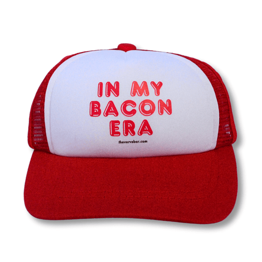 Pup Lid dog hat; red and white with red words: In my bacon era.