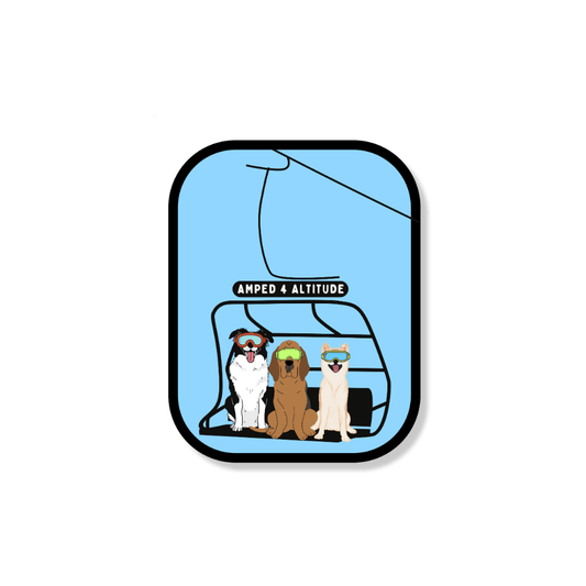 Ski dog chairlift stickers: Three dogs wearing goggles sitting on a ski lift, featuring a golden retriever, a black lab, and a brown dog, matte vinyl finish on a white background.
