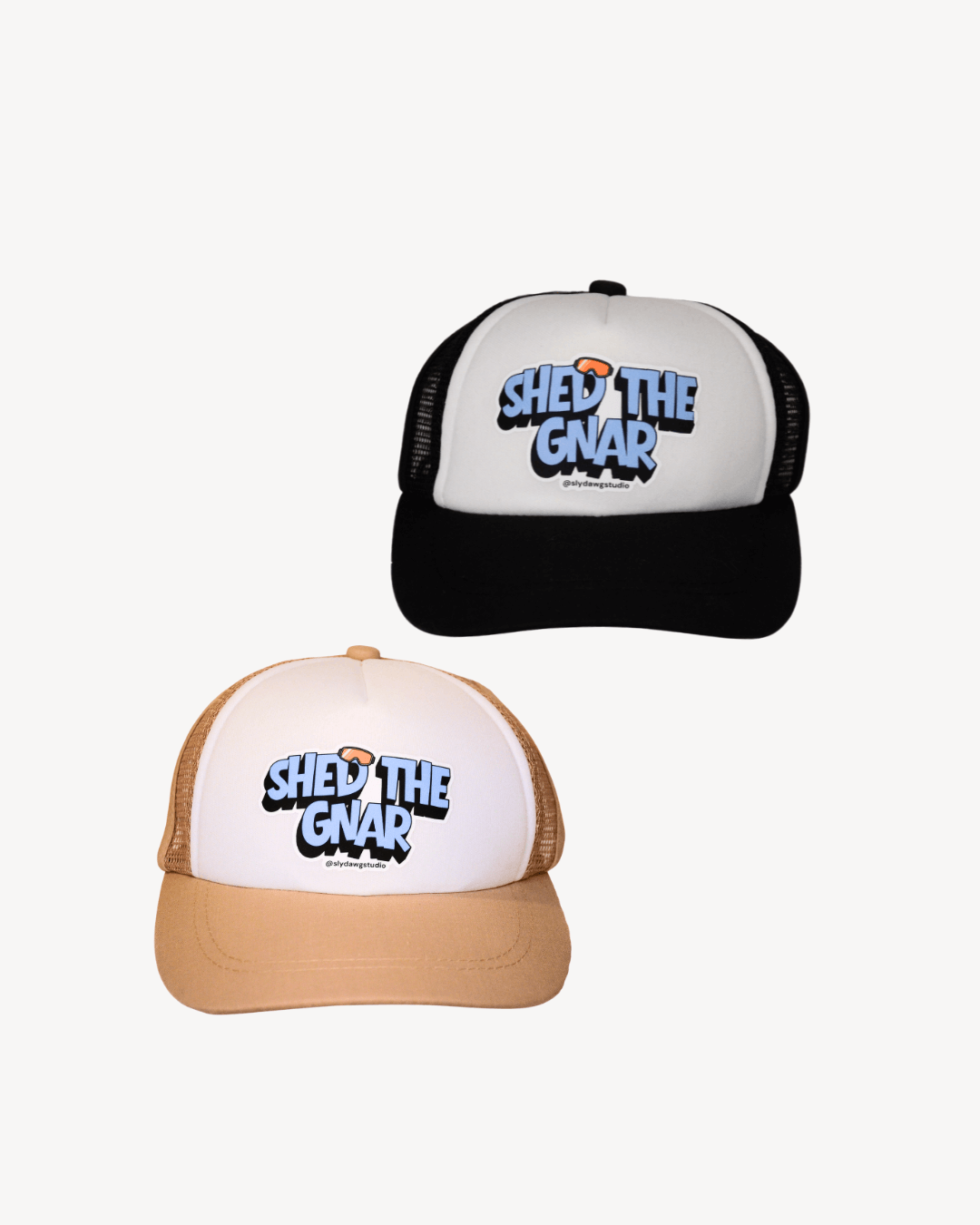 Two ski dog trucker hats with 'Shed the Gnar' text on a white background