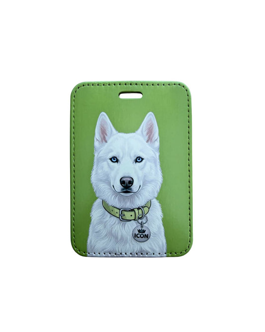 white husky luggage tag flat lay on white background showing white Siberian Husky with blue eyes and ICON round collar tag on lime green faux leather tag

