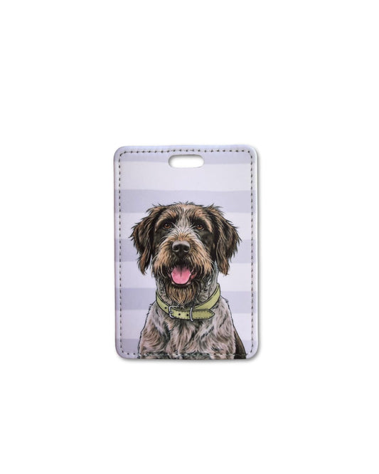 wirehaired griffon luggage tag featuring a scruffy brown and white griffon dog on a light striped background