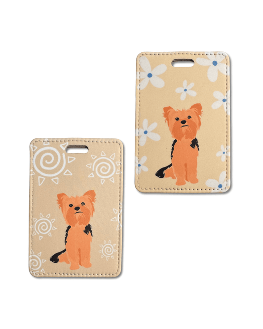 illustration yorkie luggage tag. Two styles, both on beige background, one with white flowers, one with artsy suns